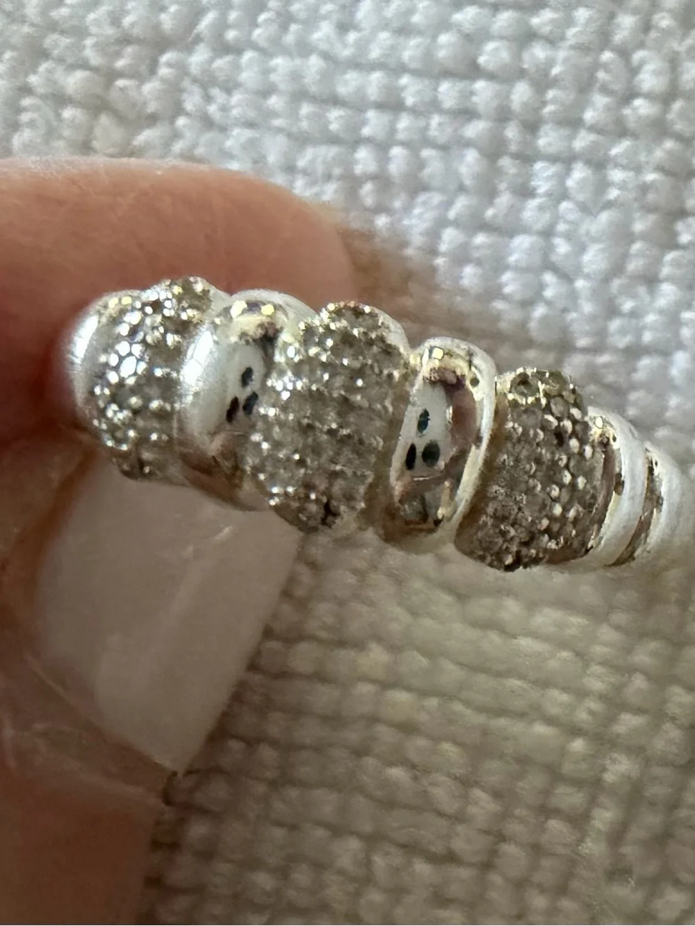 Vintage silver ribbed done ring featuring alternating pavé-set diamonds